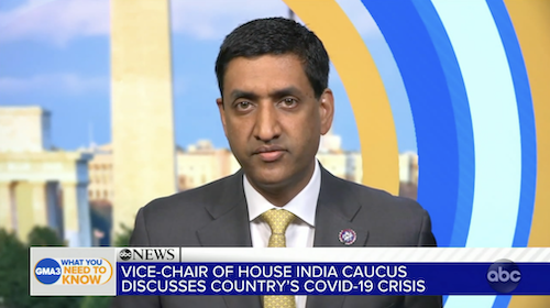A man in a suit appears on a news segment titled Vice-Chair of House India Caucus Discusses Countrys COVID-19 Crisis with colorful graphics and the Washington Monument in the background.