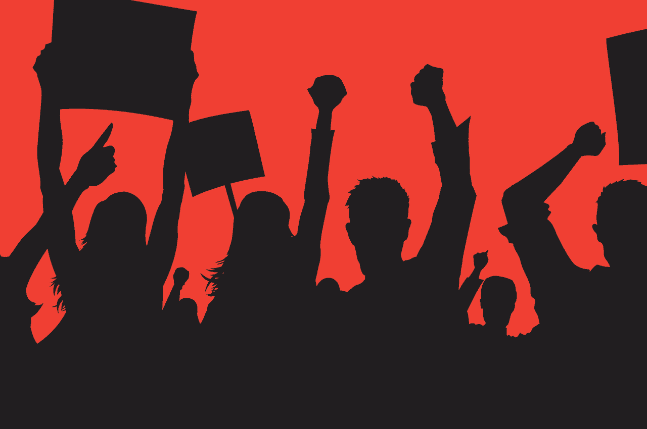 A picture of protesters holding up signs against a red background.